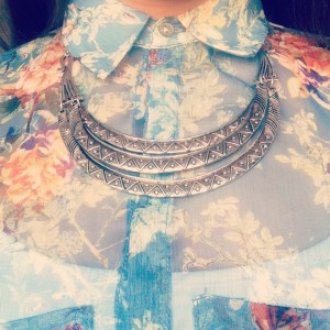A pitureof a silver statement necklace