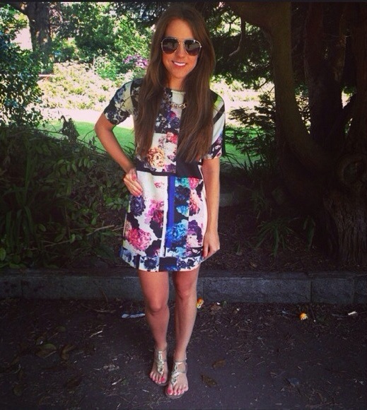 A picture of a girl wearing a Zara floral dress