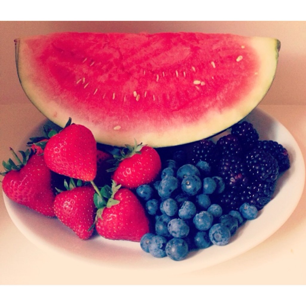 A picture of strawberries, blueberries, blackberries and watermelon