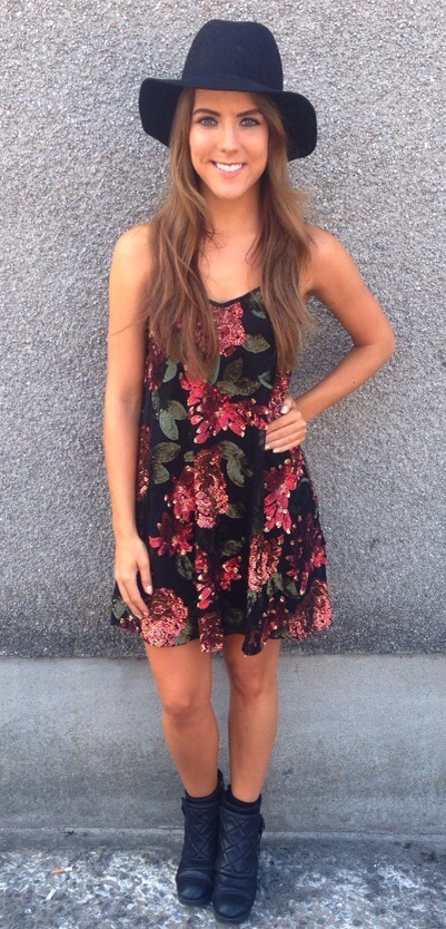 A picture of a girl wearing rose sequin cami dress from Miss Selfridge