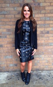 A picture of a girl wearing a faux leather dress from Miss Selfridge