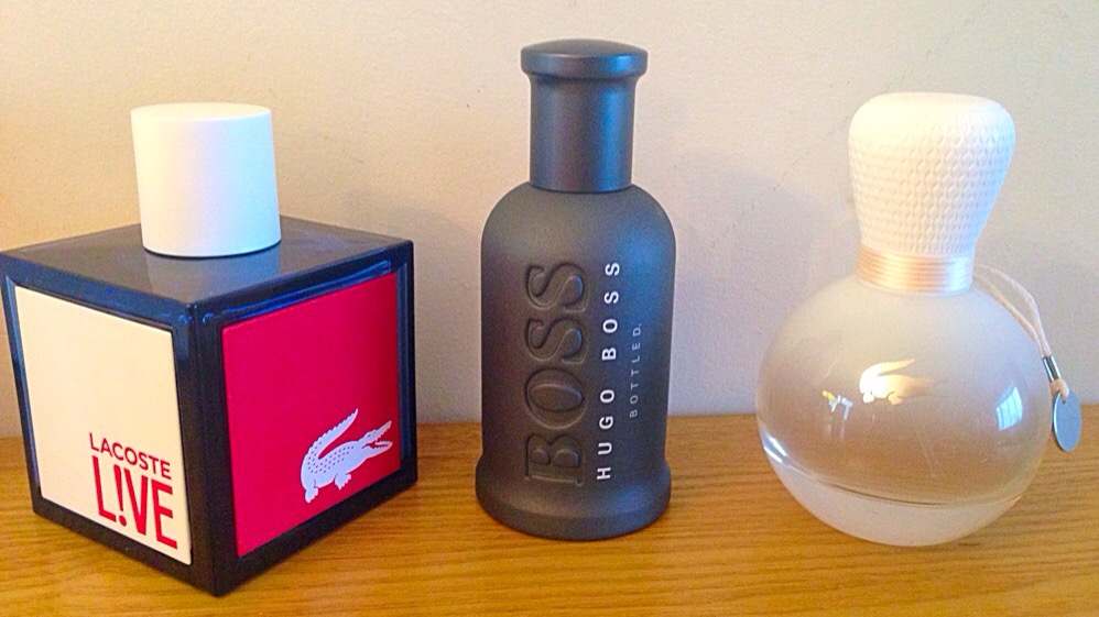 A picture of Hugo Boss and Laoste fragrances