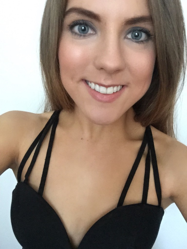 A ppicture of a girl wearing a black dress