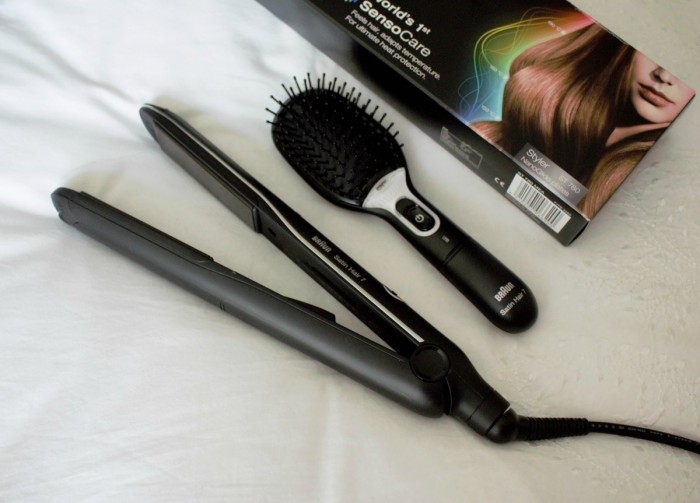 A picture of hair straighteners and a brush