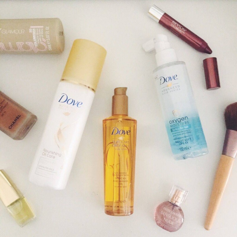 A picture of Dove hair oil, root spray and detangling spray