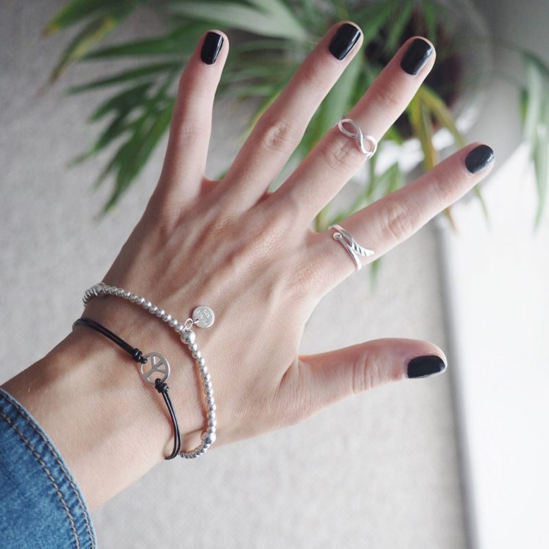 Bracelets and rings from Jewellerybox.co.uk with black nails