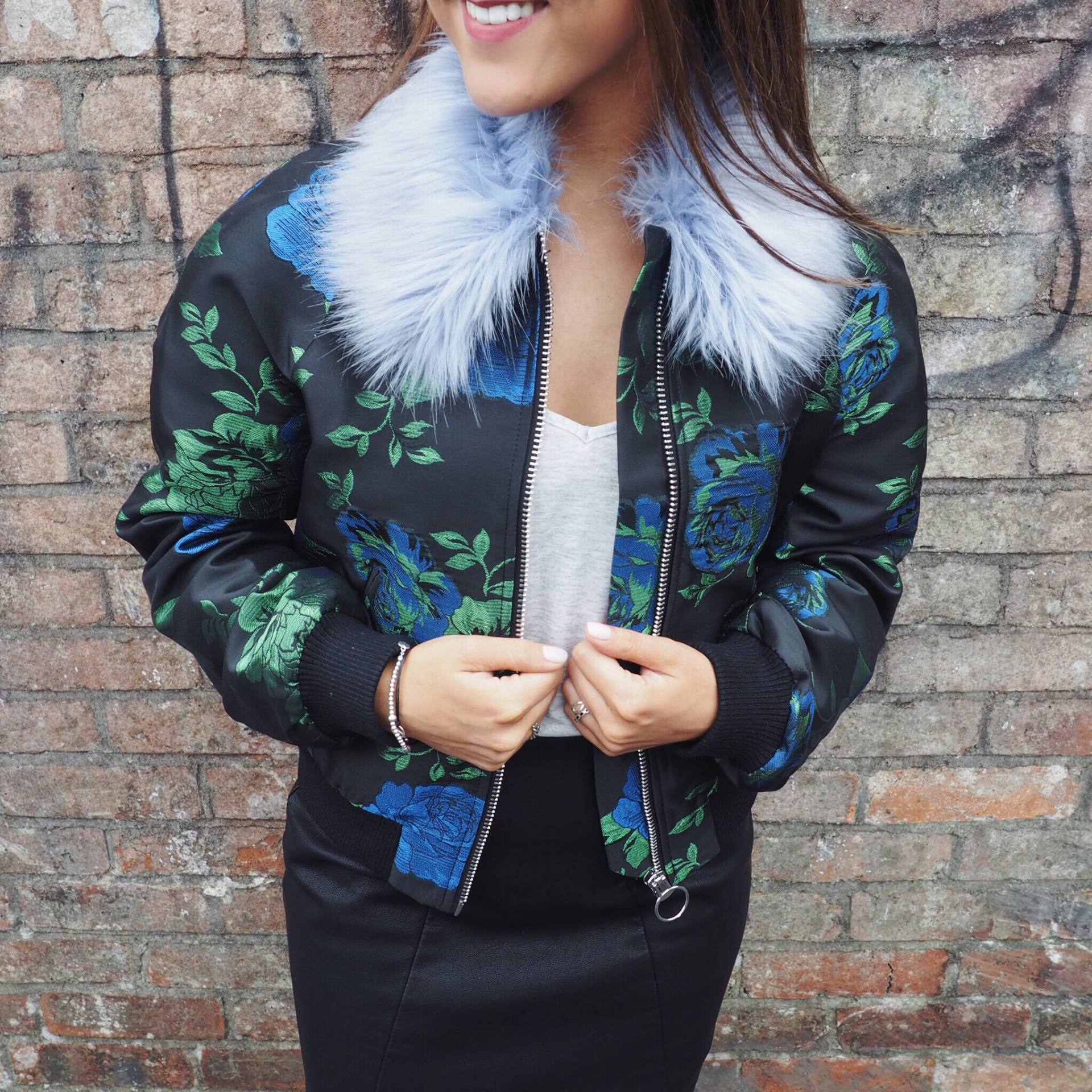 A picture of a floral bomber jacket