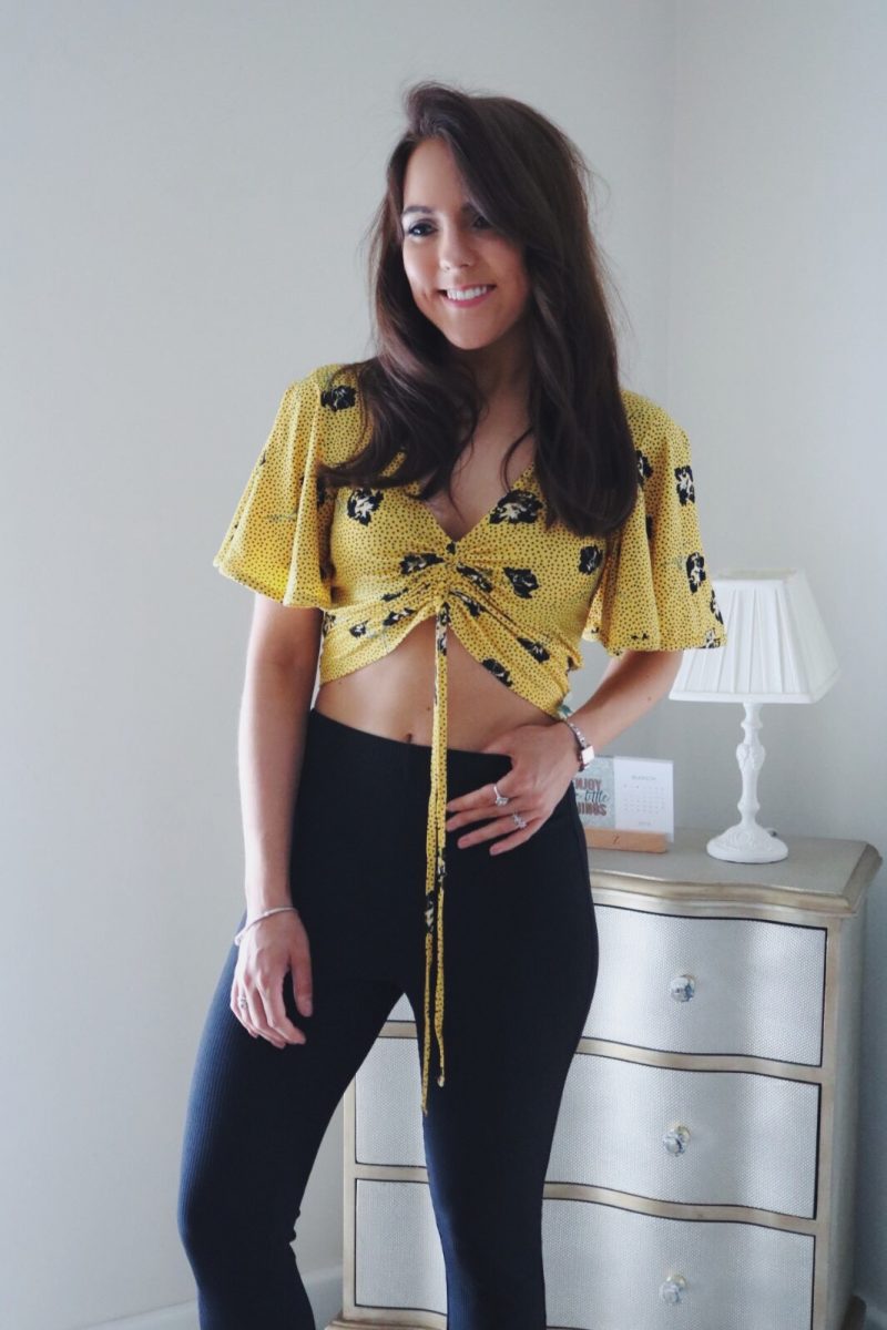 Topshop black trousers, River Island yellow crop top