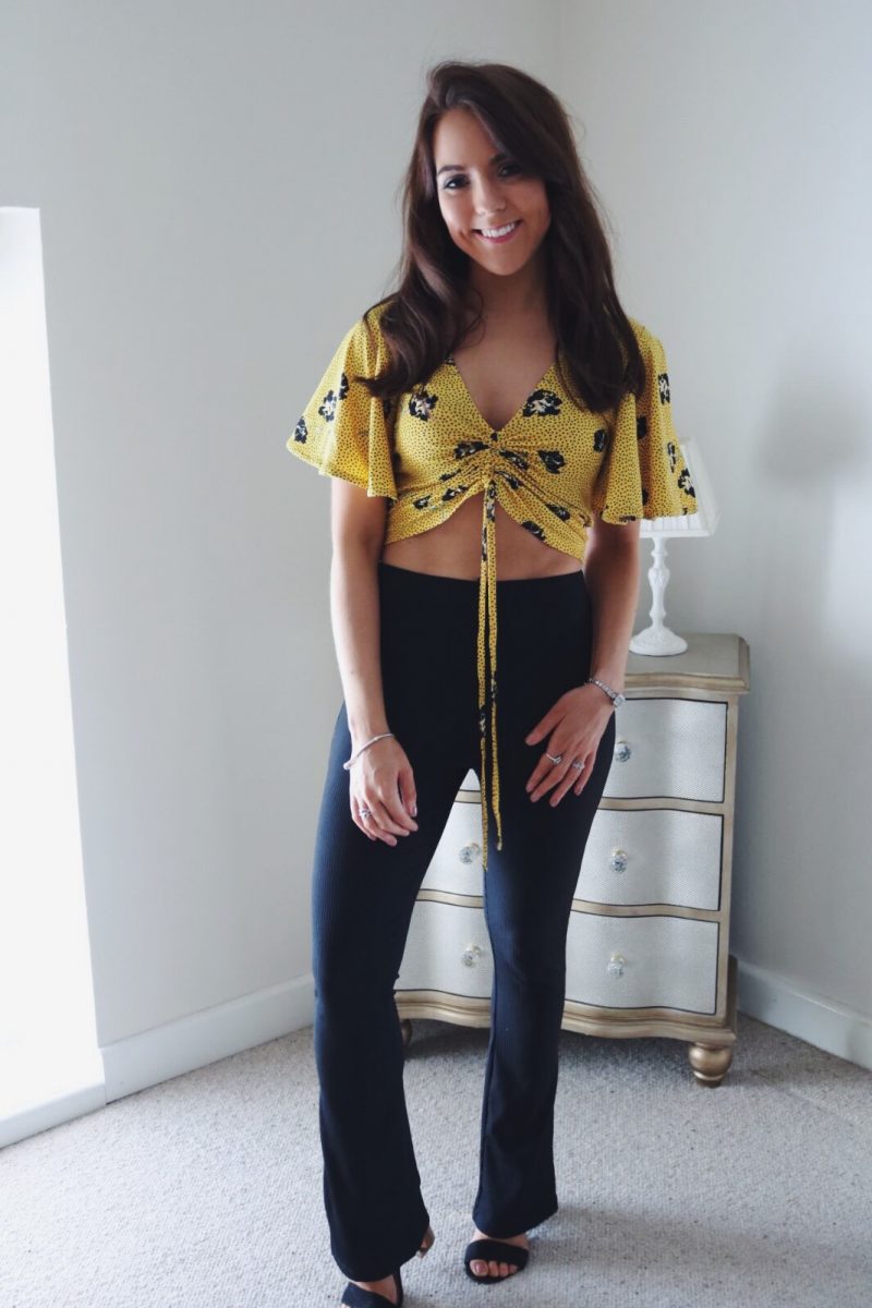 Topshop black trousers, River Island yellow crop top